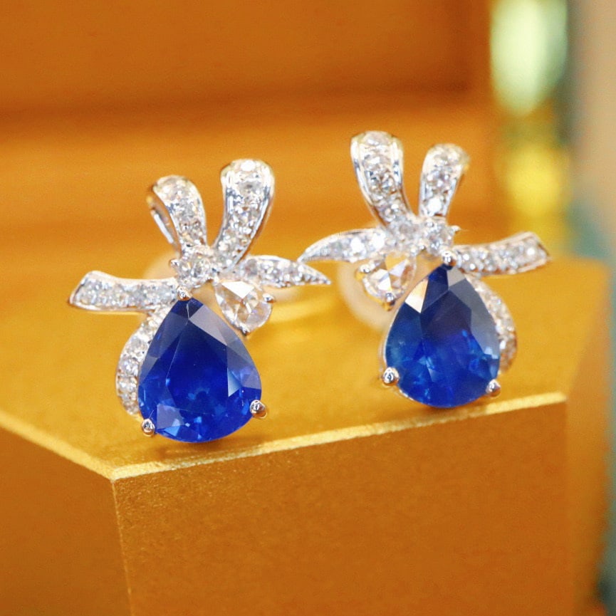 14k Gold 1.79 Ctw Natural Sapphire & Diamond Earrings: Ref:230988363 // gold content:14k gold // main gemstone:sapphire // shape:pear // carat weight:1. 55ct // color:royal blue // treatment:natural // // adjacent gemstone 2 : diamond // number of