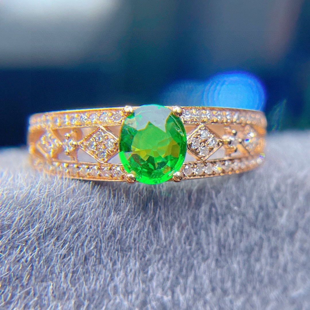 14k Gold 0.9 Ct Natural Tsavorite & Diamond Ring: Ref:230988369 // gold content:14k gold // ring size:7. 25us // // main gemstone:tsavorite // shape:oval // carat weight:0. 9ct // color:green // treatment:natural // // adjacent gemstone 2 : diamond