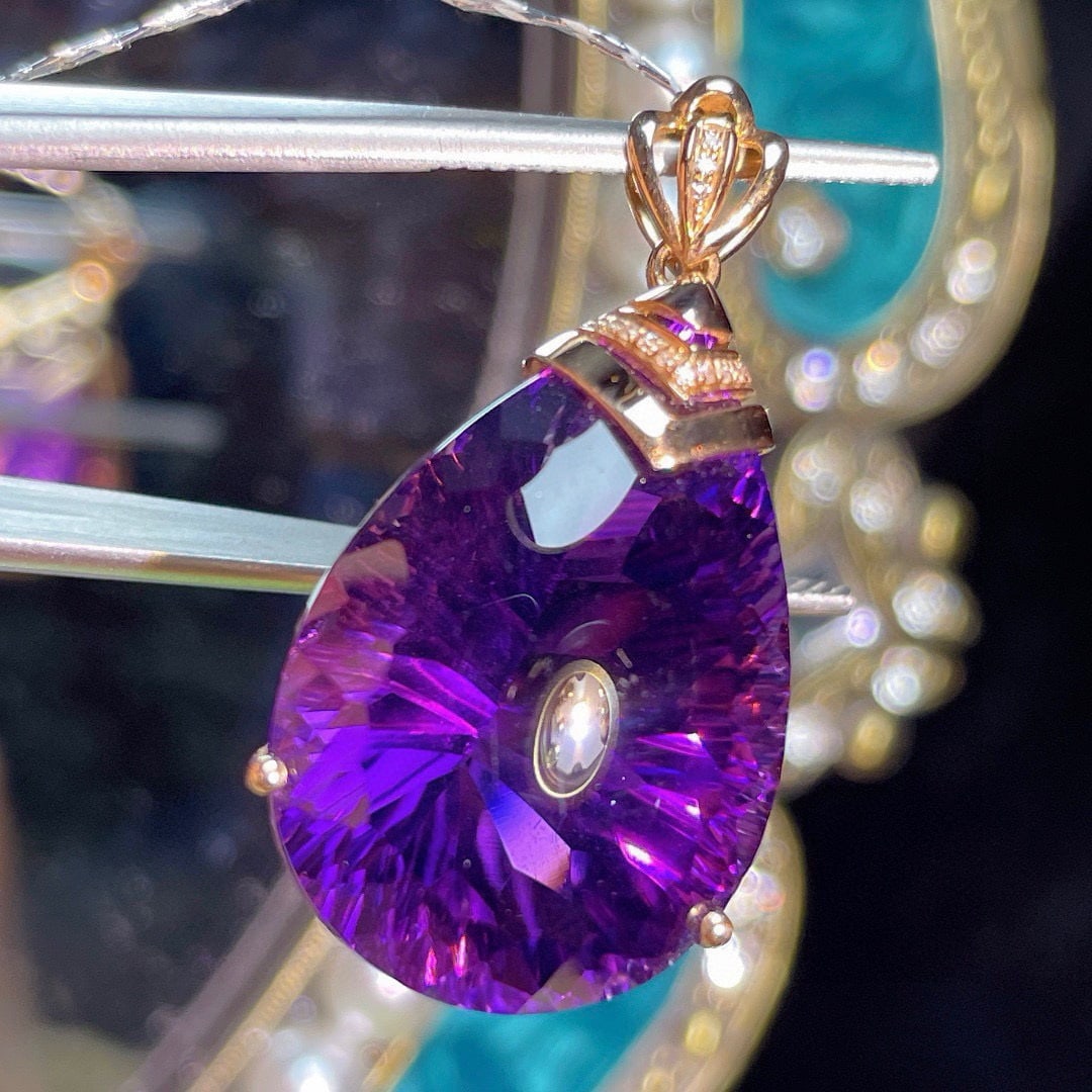 14k Gold 34.25 Ct Natural Amethyst & Diamond Pendant( Without Chain ): Ref:230988377 // gold content:14k gold // main gemstone:amethyst // shape:pear // carat weight:34. 25ct // color:purple // treatment:natural // // adjacent gemstone 2 : diamond // shape:round //