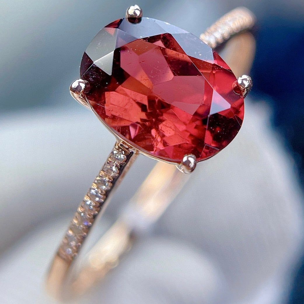 14k Gold 1.75 Ct Natural Tourmaline & Diamond Ring: Ref:230988380 // gold content:14k gold // ring size:7. 25us // // main gemstone:tourmaline // shape:oval // carat weight:1. 75ct // color:red // treatment:natural // // adjacent gemstone 2 : diamond /