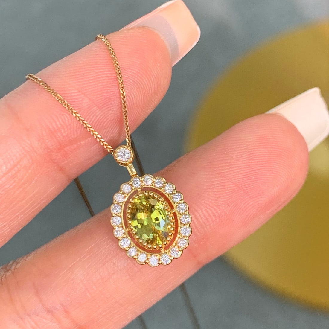 14k Gold 1.06 Ctw Natural Sapphire & Diamond Pendant( Without Chain ): Ref:230988389 // gold content:14k gold // main gemstone:sapphire // shape:oval // carat weight:0. 83ct // color:yellow // treatment:natural // // adjacent gemstone 2 : diamond // shape:round // carat