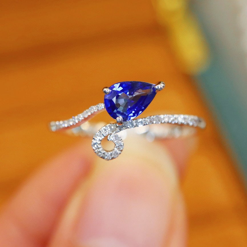 14k Gold 0.58 Ctw Natural Sapphire & Diamond Ring: Ref:230988395 // gold content:14k gold // ring size:7. 25us // // main gemstone:sapphire // shape:pear // carat weight:0. 50ct // color:blue // treatment:natural // // adjacent gemstone 2 : diamond