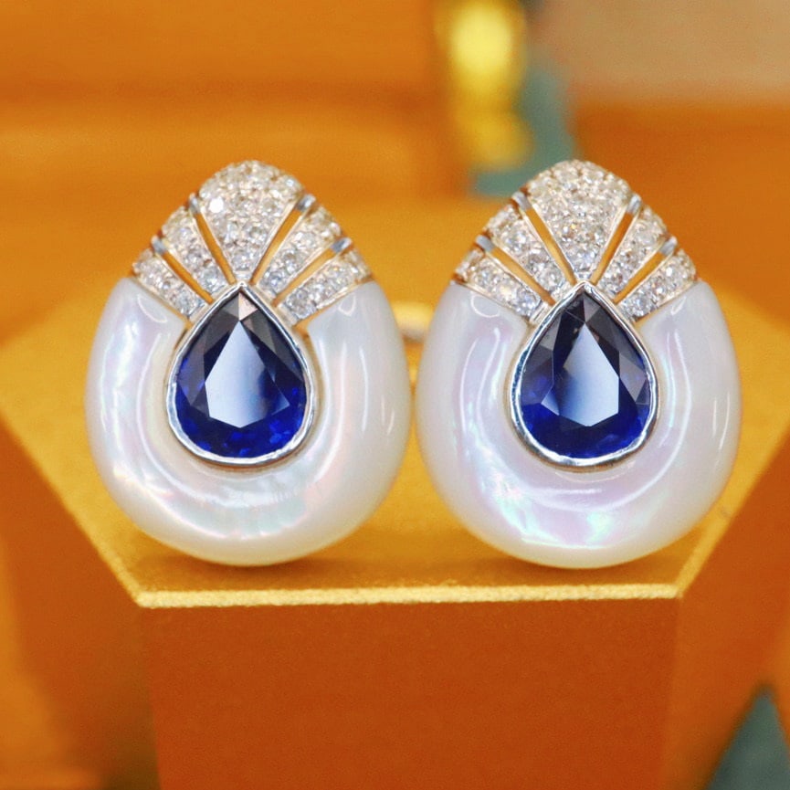 14k Gold 1.50 Ctw Natural Sapphire & Diamond Earrings: Ref:230988398 // gold content:14k gold // main gemstone:sapphire // shape:pear // carat weight:1. 30ct // color:royal blue // treatment:natural // // adjacent gemstone 2 : diamond // number of