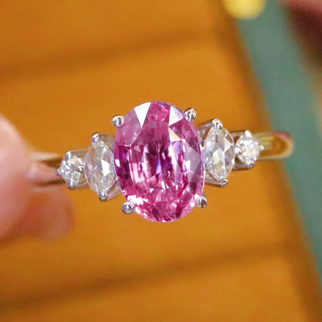 14k Gold 1.20 Ctw Natural Padparadscha Sapphire & Diamond Ring: Ref:230988400 // gold content:14k gold // ring size:7. 25us // // main gemstone:padparadscha sapphire // shape:oval // carat weight:1. 08ct // color:orangish pink // treatment:natural // // adjacent g