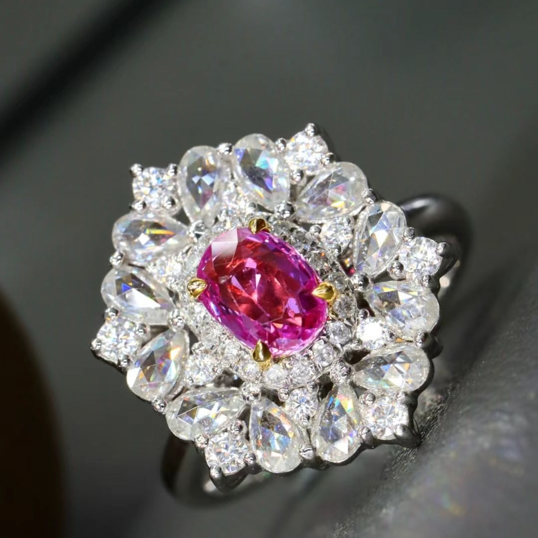14k Gold 0.78 Ctw Natural Padparadscha Sapphire & Diamond Ring: Ref:230988409 // gold content:14k gold // ring size:7. 25us // // main gemstone:padparadscha sapphire // shape:oval // carat weight:0. 69ct // color:orangish pink // treatment:natural // // adjacent g