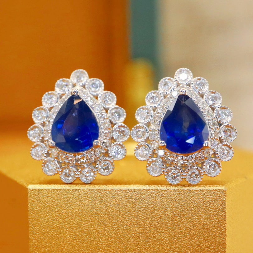 14k Gold 1.81 Ctw Natural Sapphire & Diamond Earrings: Ref:230988447 // gold content:14k gold // main gemstone:sapphire // shape:pear // carat weight:1. 39ct // color:royal blue // treatment:natural // // adjacent gemstone 2 : diamond // number of