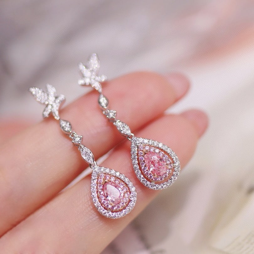 Gia Certified 14k Gold 1.32 Ctw Natural Pink Diamond & Diamond Earrings: Ref:230991013 // gold content:14k gold // main gemstone:pink diamond // certified:gia // shape:pear // carat weight:0. 65ct // clarity grade:si1 // color:pink // treatment:natural //