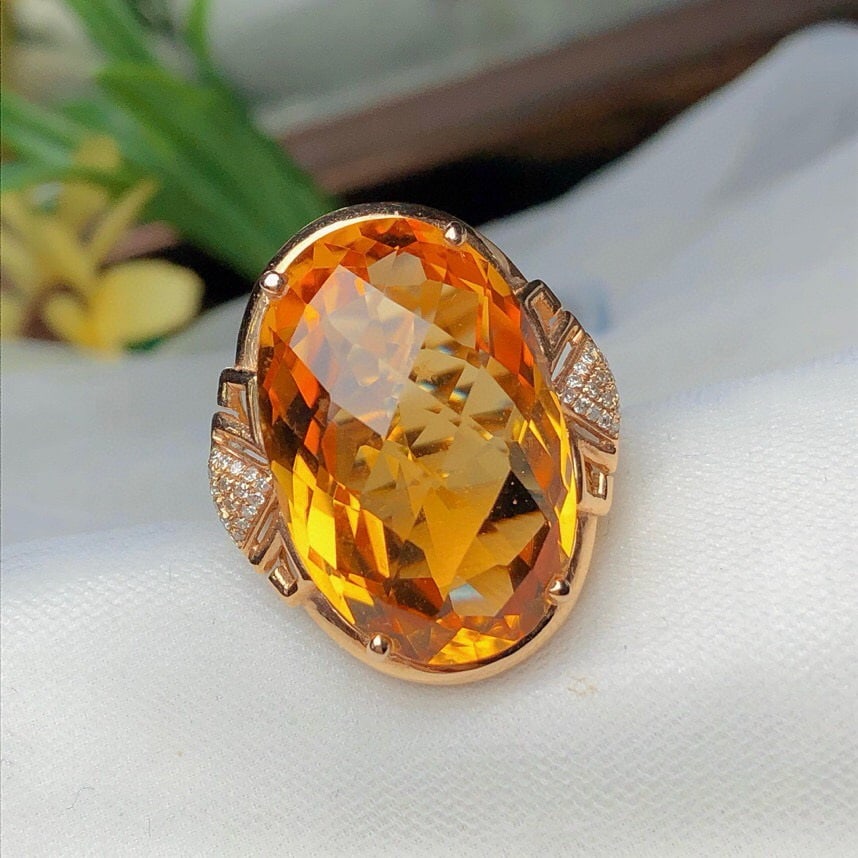 14k Gold 19.03 Ct Natural Citrine & Diamond Ring: Ref:230991031 // gold content:14k gold // ring size:7. 25us // // main gemstone:citrine // shape:oval // carat weight:19. 03ct // color:yellow // treatment:natural // // adjacent gemstone 2 : diamond