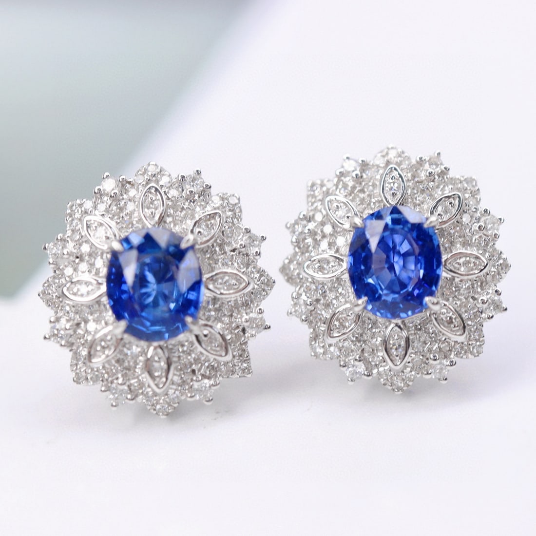 14k Gold 2.26 Ctw Natural Sapphire & Diamond Earrings: Ref:230991032 // gold content:14k gold // main gemstone:sapphire // shape:oval // carat weight:1. 7ct // color:blue // treatment:natural // // adjacent gemstone 2 : diamond // shape:round // carat wei