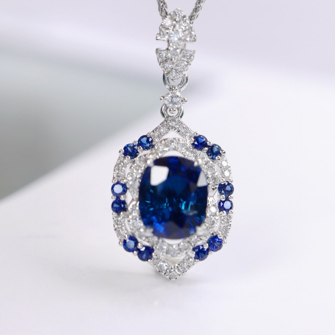 14k Gold 2.17 Ctw Natural Sapphire & Diamond Pendant( Without Chain ): Ref:230991034 // gold content:14k gold // main gemstone:sapphire // shape:oval // carat weight:1. 90ct // color:royal blue // treatment:natural // // adjacent gemstone 2 : diamond // shape:round // ca