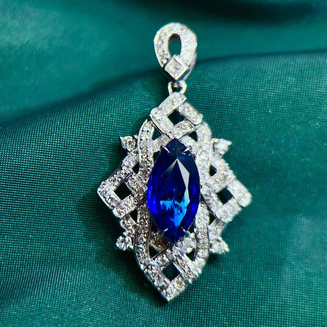 14k Gold 2.56 Ctw Natural Sapphire & Diamond Pendant( Without Chain ): Ref:230991054 // gold content:14k gold // main gemstone:sapphire // shape:marquise // carat weight:2. 1ct // color:blue // treatment:natural // // adjacent gemstone 2 : diamond // shape:round //