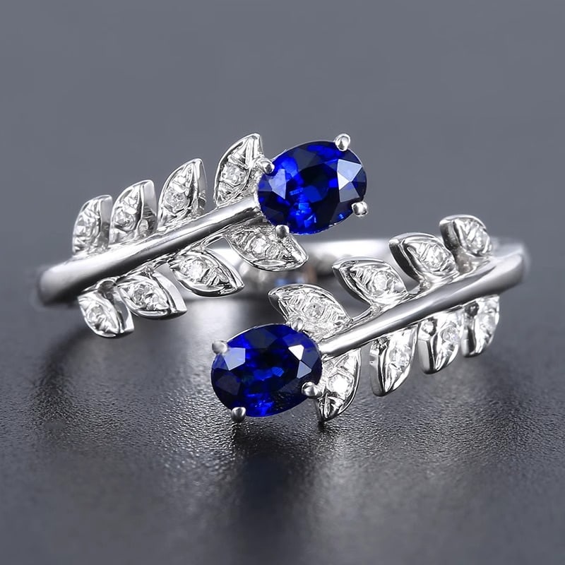 14k Gold 0.70 Ctw Natural Sapphire & Diamond Ring: Ref:230991068 // gold content:14k gold // ring size:7. 25us // // main gemstone:sapphire // shape:oval // carat weight:0. 65ct // color:blue // treatment:natural // // adjacent gemstone 2 : diamond //