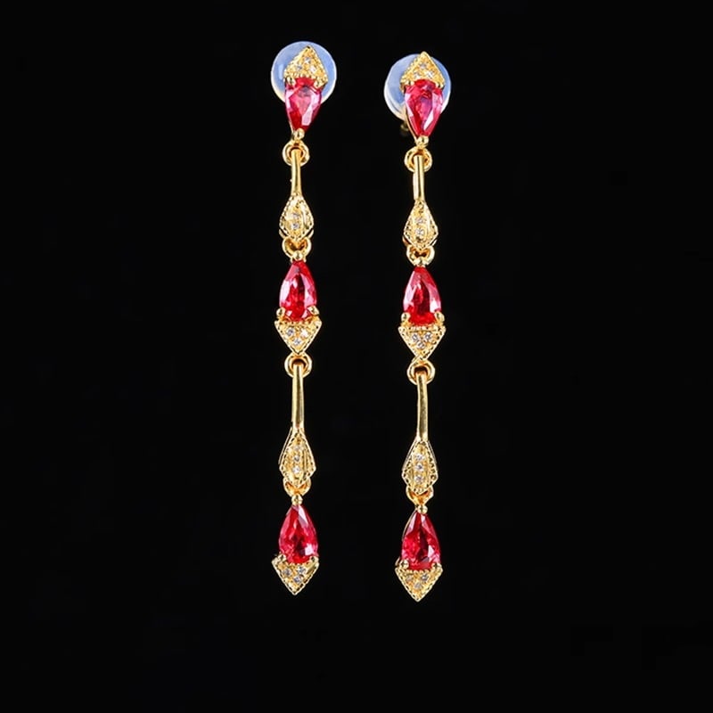 14k Gold 1.25 Ct Natural Ruby & Diamond Earrings: Ref:230991073 // gold content:14k gold // main gemstone:ruby // shape:pear // carat weight:1. 25ct // color:red // treatment:natural // // adjacent gemstone 2 : diamond // number of stones:28 // shape