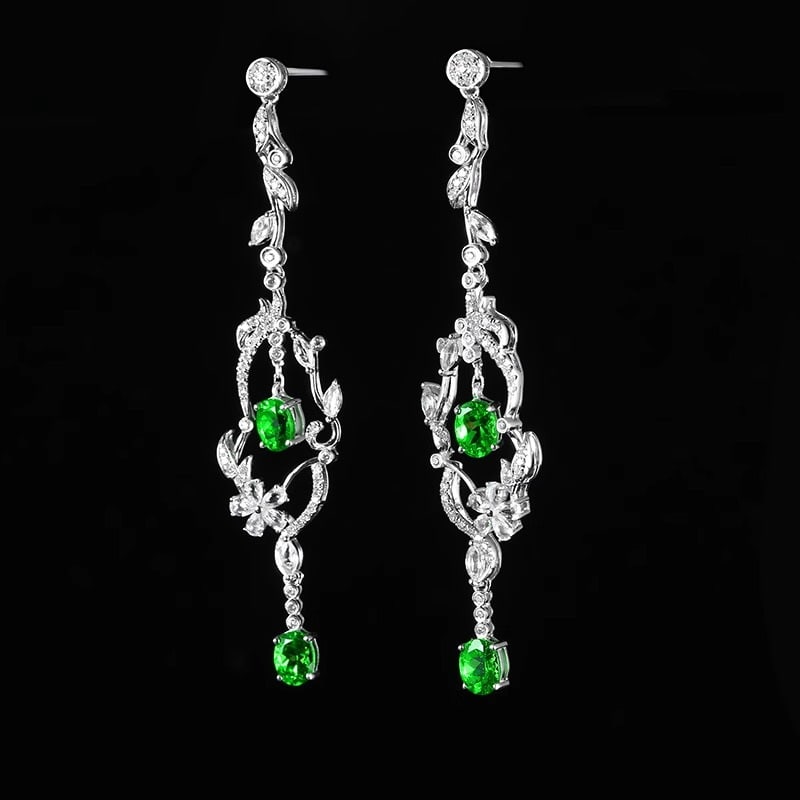 14k Gold 2.88 Ctw Natural Tsavorite & Diamond & Sapphire Earrings: Ref:230991079 // gold content:14k gold // main gemstone:tsavorite // shape:oval // carat weight:1. 6ct // color:green // treatment:natural // // adjacent gemstone 2 : diamond // number of stones:112 /