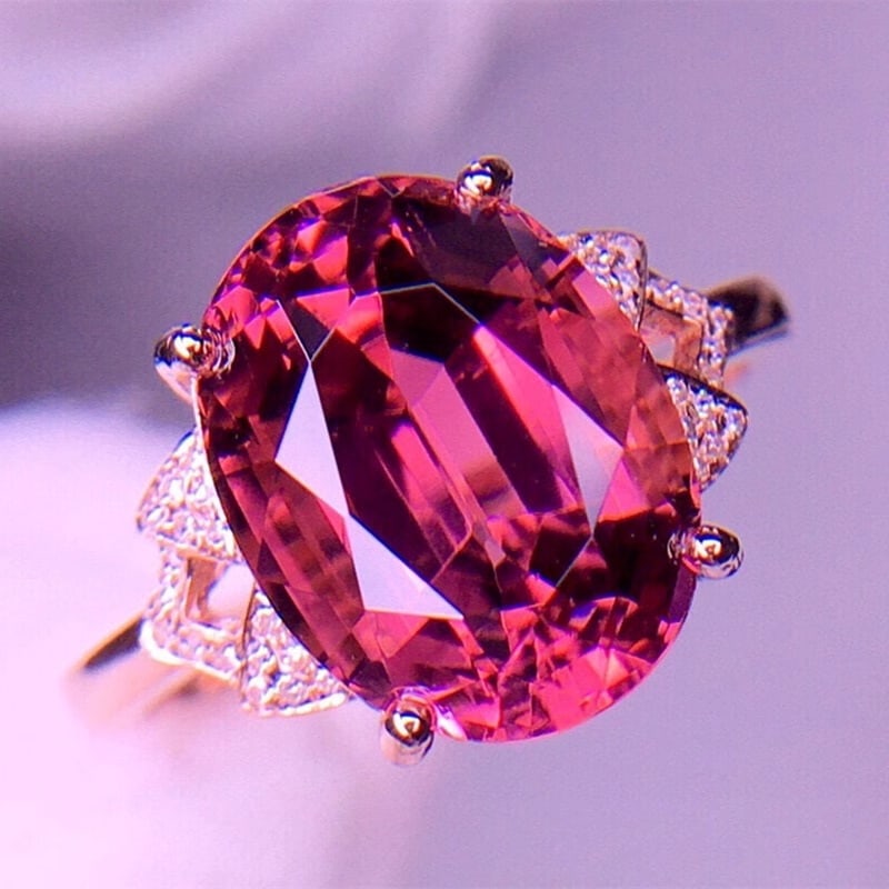 14k Gold 5.8 Ct Natural Tourmaline & Diamond Ring: Ref:230991082 // gold content:14k gold // ring size:7. 25us // // main gemstone:tourmaline // shape:oval // carat weight:5. 8ct // color:red // treatment:natural // // adjacent gemstone 2 : diamond //