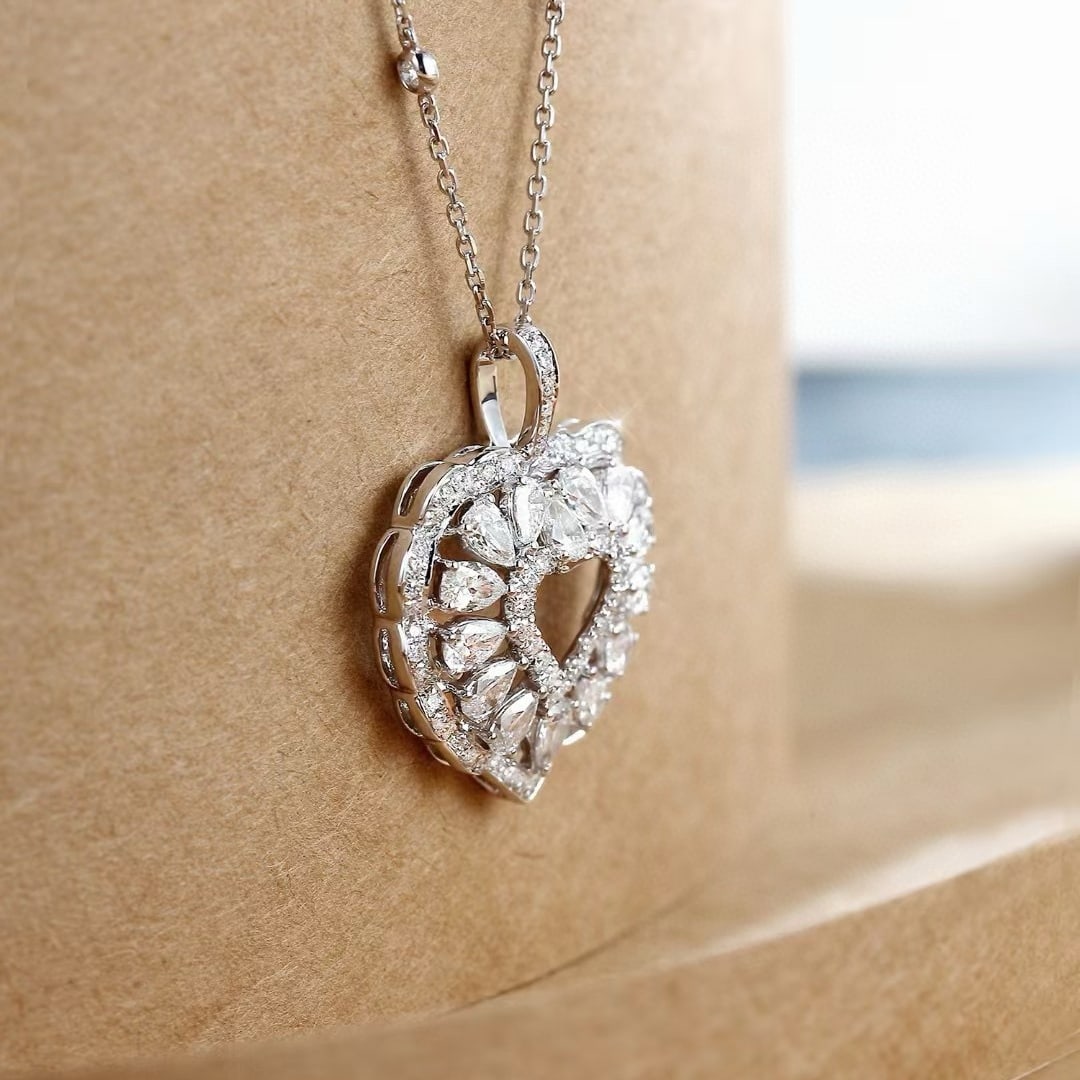 14k Gold 1.19 Ctw Natural H Diamond Pendant( Without Chain ): Ref:230991130 // gold content:14k gold // main gemstone:diamond // shape:pear // carat weight:0. 94ct // clarity grade:vs-si // color:h // treatment:natural // // adjacent gemstone 2 : diamond //