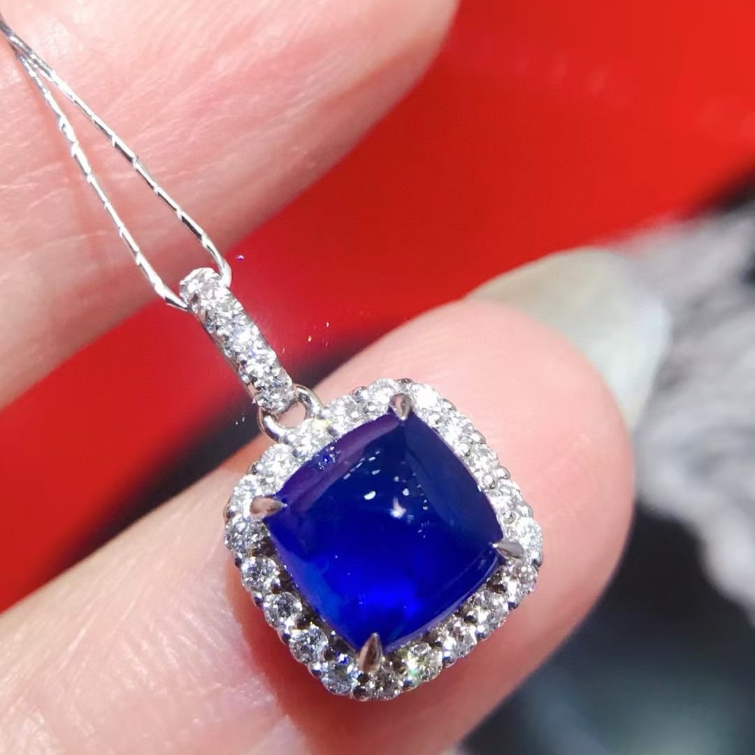 14k Gold 1.70 Ctw Natural Sapphire & Diamond Pendant( Without Chain ): Ref:230991140 // gold content:14k gold // main gemstone:sapphire // shape:suger-loaf // carat weight:1. 37ct // color:royal blue // treatment:natural // // adjacent gemstone 2 : diamond //