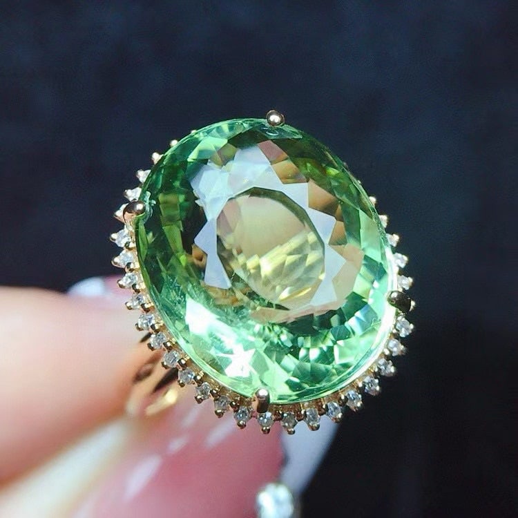 14k Gold 11 Ct Natural Tourmaline & Diamond Ring: Ref:230991143 // gold content:14k gold // ring size:7. 25us // // main gemstone:tourmaline // shape:oval // carat weight:11ct // color:green // treatment:natural // // adjacent gemstone 2 : diamond //