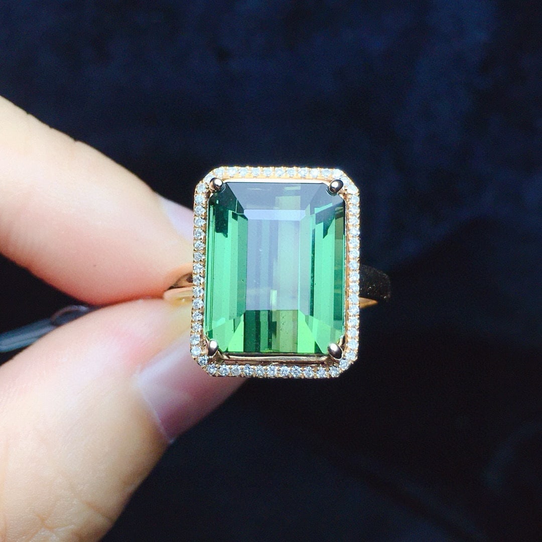 14k Gold 8.85 Ct Natural Tourmaline & Diamond Ring: Ref:230991148 // gold content:14k gold // ring size:7. 25us // // main gemstone:tourmaline // shape:octagonal // carat weight:8. 85ct // color:green // treatment:natural // // adjacent gemstone 2 : di