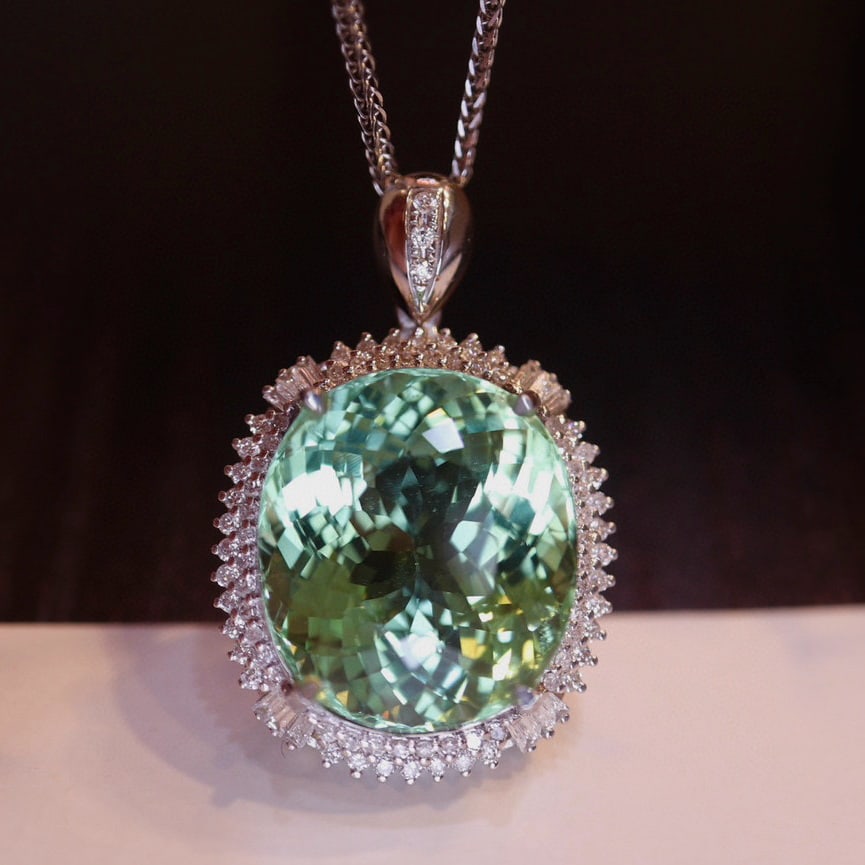 14k Gold 16.6 Ct Natural Tourmaline & Diamond Pendant( Without Chain ): Ref:230991157 // gold content:14k gold // main gemstone:tourmaline // shape:oval // carat weight:16. 6ct // color:green // treatment:natural // // adjacent gemstone 2 : diamond // number of stones:91 