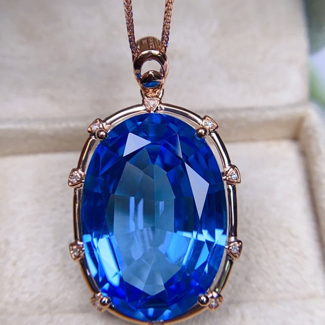 14k Gold 23.33 Ctw Natural Topaz & Diamond Pendant( Without Chain ): Ref:230991161 // gold content:14k gold // main gemstone:topaz // shape:oval // carat weight:23. 3ct // color:blue // treatment:natural // // adjacent gemstone 2 : diamond // number of stones:10 // sha