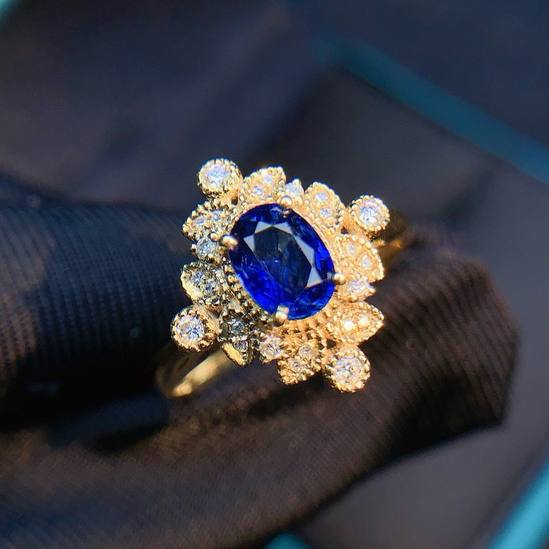 14k Gold 0.81 Ct Natural Sapphire & Diamond Ring: Ref:230991167 // gold content:14k gold // ring size:7. 25us // // main gemstone:sapphire // shape:oval // carat weight:0. 81ct // color:blue // treatment:natural // // adjacent gemstone 2 : diamond //