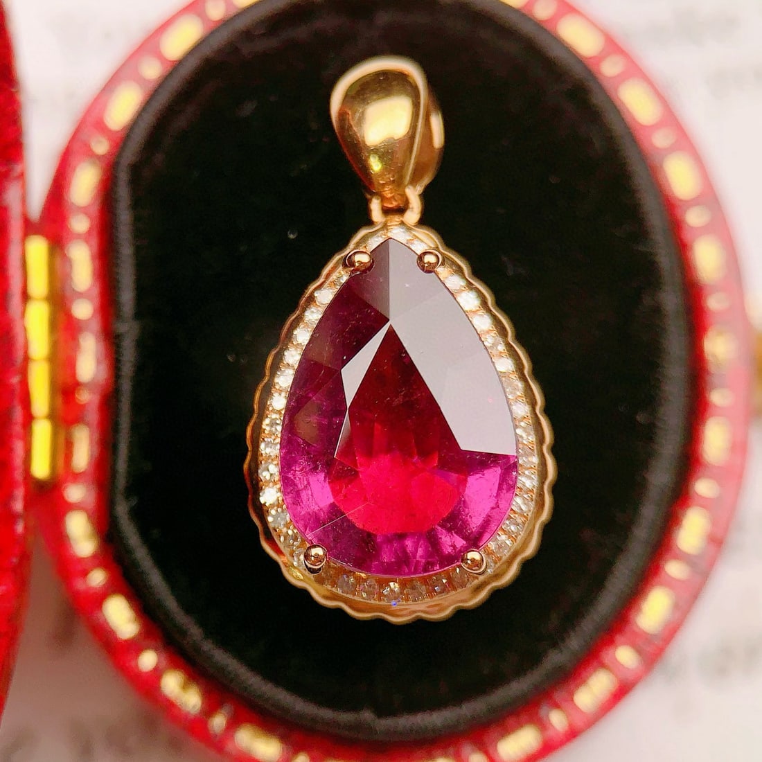 14k Gold 4.32 Ctw Natural Tourmaline & Diamond Pendant( Without Chain ): Ref:230991192 // gold content:14k gold // main gemstone:tourmaline // shape:pear // carat weight:4. 2ct // color:red // treatment:natural // // adjacent gemstone 2 : diamond // number of stones:42 //