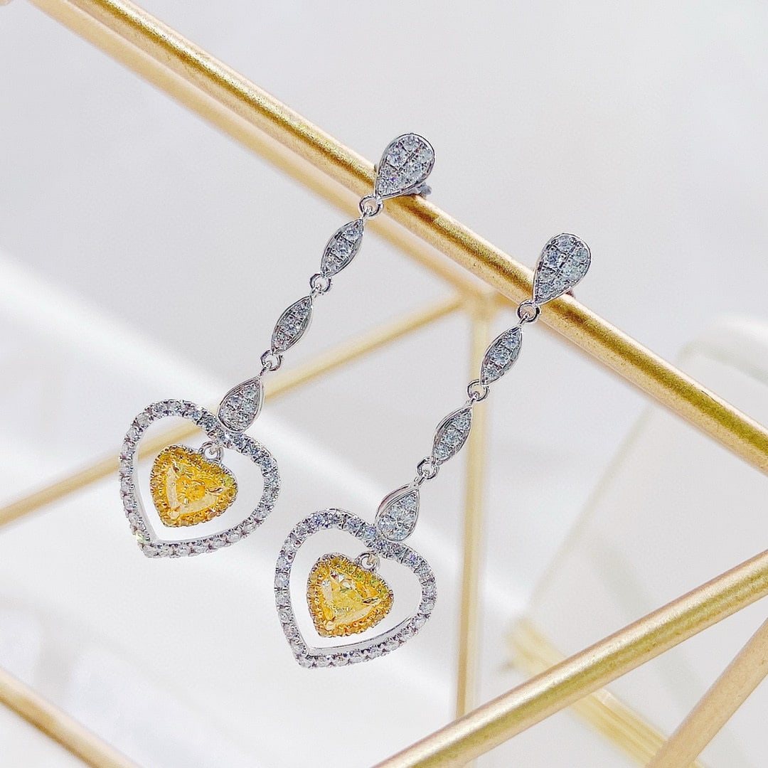 14k Gold 0.67 Ctw Natural Yellow Diamond & Diamond Earrings: Ref:230991223 // gold content:14k gold // main gemstone:yellow diamond // shape:heart // carat weight:0. 4ct // color:yellow // treatment:natural // // adjacent gemstone 2 : diamond // shape:round // 