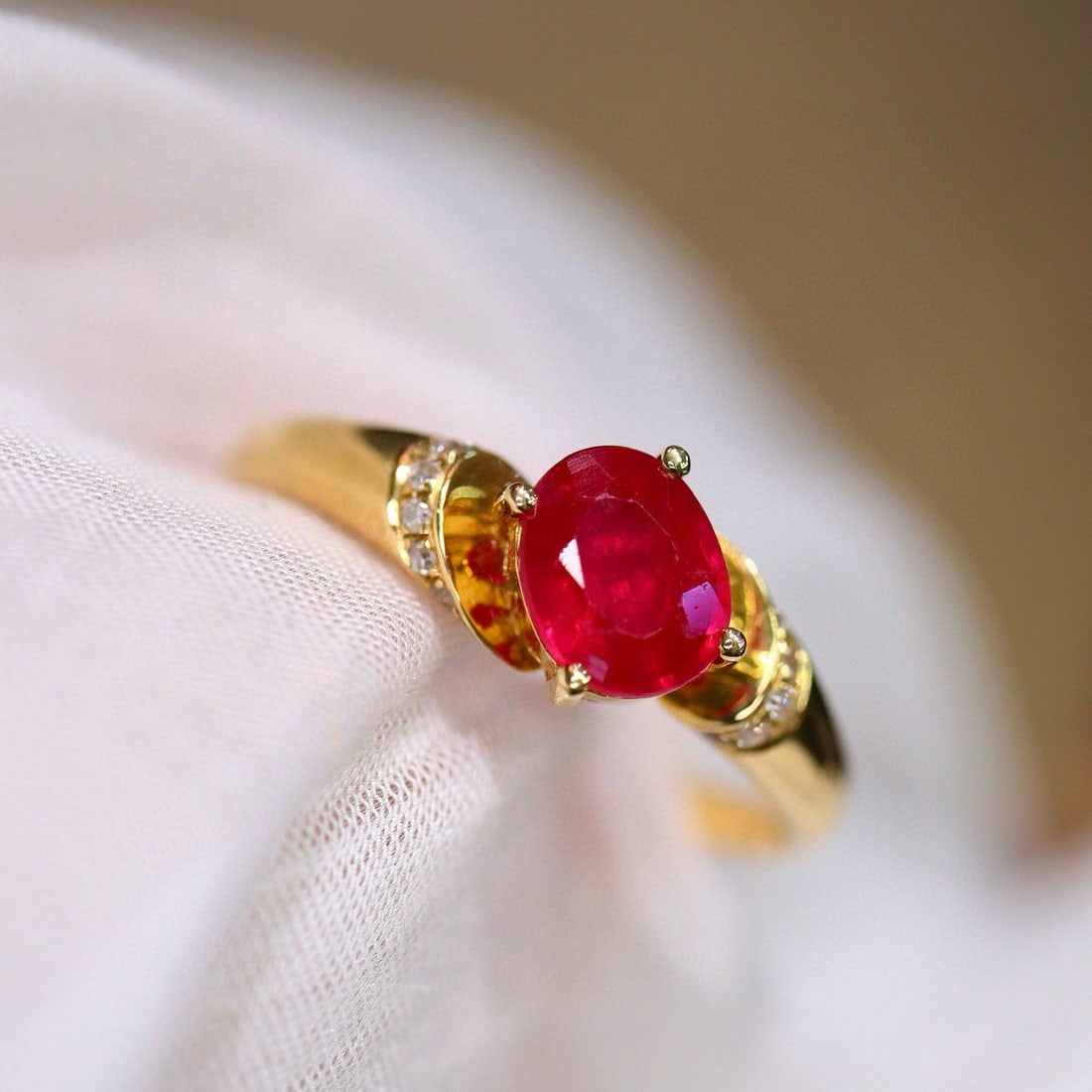 14k Gold 0.91 Ctw Natural Ruby & Diamond Ring: Ref:230991229 // gold content:14k gold // ring size:7. 25us // // main gemstone:ruby // shape:oval // carat weight:0. 86ct // color:red // treatment:natural // // adjacent gemstone 2 : diamond //