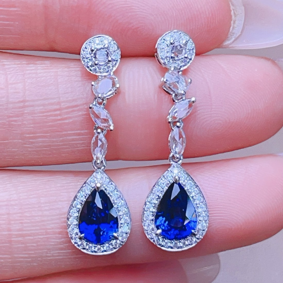14k Gold 2.7 Ctw Natural Sapphire & Diamond Earrings: Ref:230991243 // gold content:14k gold // main gemstone:sapphire // shape:pear // carat weight:2. 4ct // color:blue // treatment:natural // // adjacent gemstone 2 : diamond // shape:round // carat wei