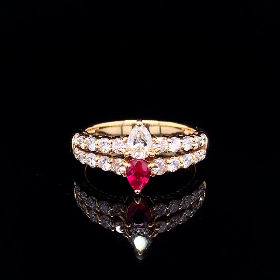 14k Gold 1.35 Ctw Natural Ruby & Diamond Ring: Ref:230992008 // gold content:14k gold // ring size:7. 25us // // main gemstone:ruby // shape:pear // carat weight:0. 34ct // color:red // treatment:natural // // adjacent gemstone 2 : diamond //