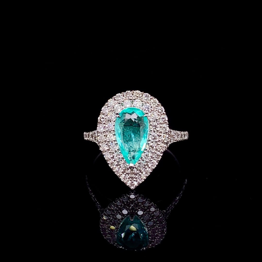 14k Gold 1.62 Ctw Natural Paraiba Tourmaline & Diamond Ring: Ref:230992011 // gold content:14k gold // ring size:7. 25us // // main gemstone:paraiba tourmaline // shape:pear // carat weight:0. 92ct // color:blue // treatment:natural // // adjacent gemstone 2 : 