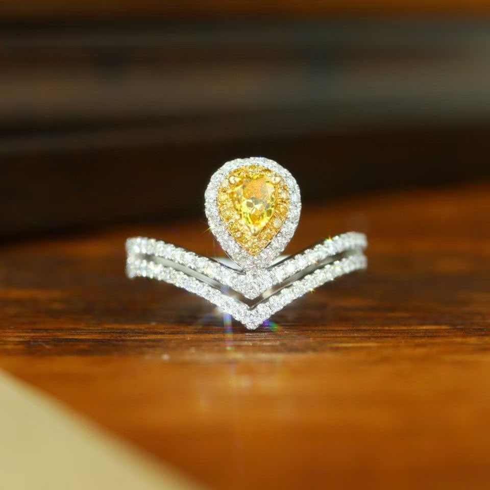 14k Gold 0.80 Ctw Natural Yellow Diamond & Diamond Ring: Ref:230992019 // gold content:14k gold // ring size:7. 25us // // main gemstone:yellow diamond // shape:pear // carat weight:0. 28ct // color:yellow // treatment:natural // // adjacent gemstone 2 :