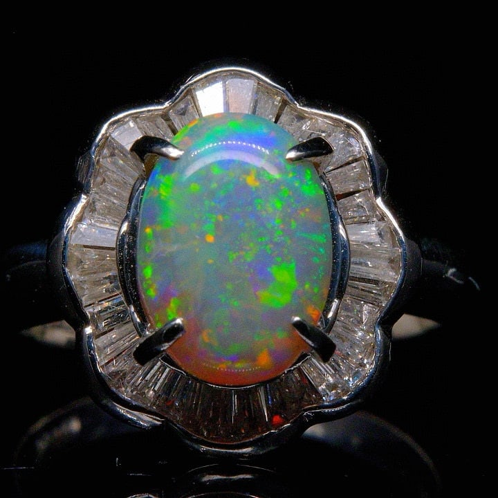 14k Gold 2.62 Ctw Natural Opal & Diamond Ring: Ref:230992022 // gold content:14k gold // ring size:7. 25us // // main gemstone:opal // shape:oval // carat weight:1. 96ct // color:color // treatment:natural // // adjacent gemstone 2 : diamond // sh