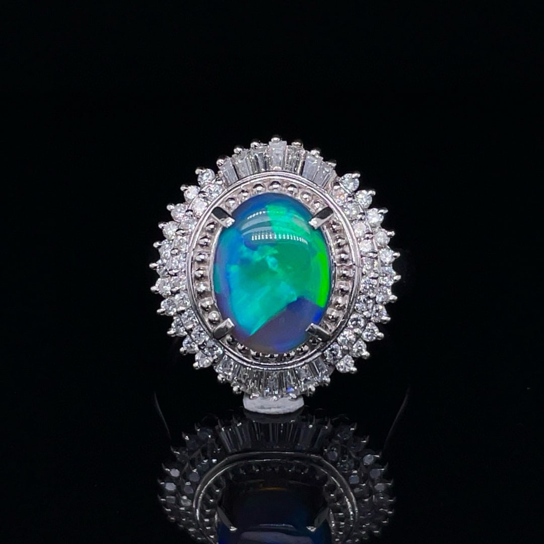 14k Gold 2.45 Ctw Natural Opal & Diamond Ring: Ref:230992023 // gold content:14k gold // ring size:7. 25us // // main gemstone:opal // shape:oval // carat weight:1. 98ct // color:color // treatment:natural // // adjacent gemstone 2 : diamond //
