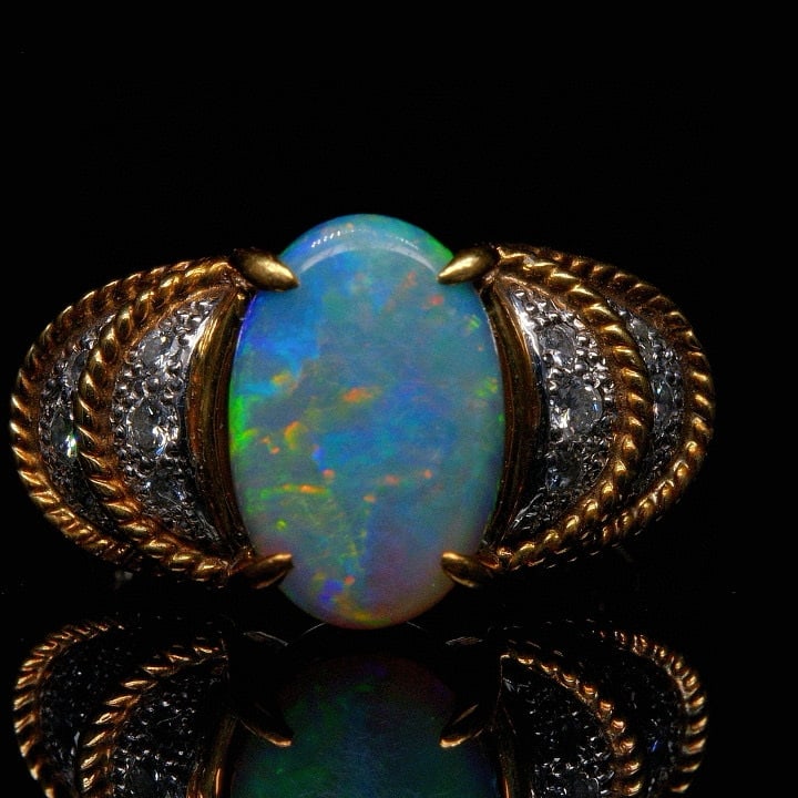 14k Gold 2.35 Ctw Natural Opal & Diamond Ring: Ref:230992024 // gold content:14k gold // ring size:7. 25us // // main gemstone:opal // shape:oval // carat weight:2. 1ct // color:color // treatment:natural // // adjacent gemstone 2 : diamond // sha