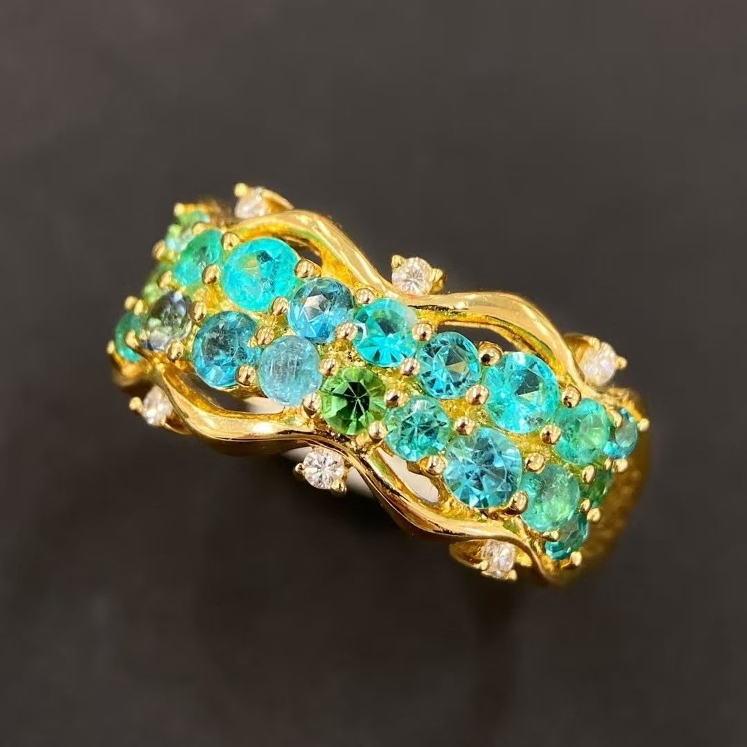 14k Gold 1.30 Ctw Natural Paraiba Tourmaline & Diamond Ring: Ref:230992025 // gold content:14k gold // ring size:7. 25us // // main gemstone:paraiba tourmaline // shape:round // carat weight:1. 20ct // color:blue // treatment:natural // cut grade:g // //