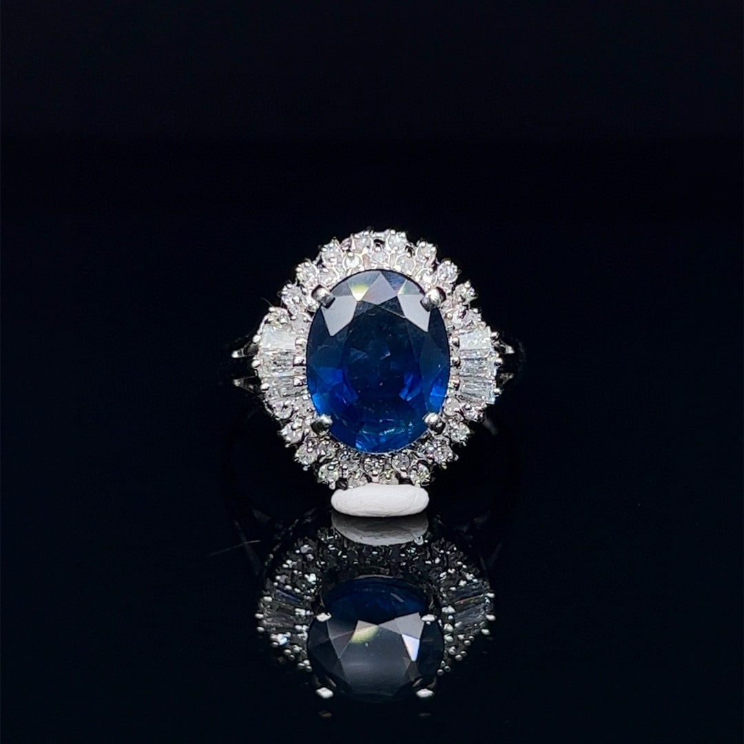 14k Gold 4.05 Ctw Natural Sapphire & Diamond Ring: Ref:230992050 // gold content:14k gold // ring size:7. 25us // // main gemstone:sapphire // shape:oval // carat weight:3. 7ct // color:blue // treatment:natural // // adjacent gemstone 2 : diamond //