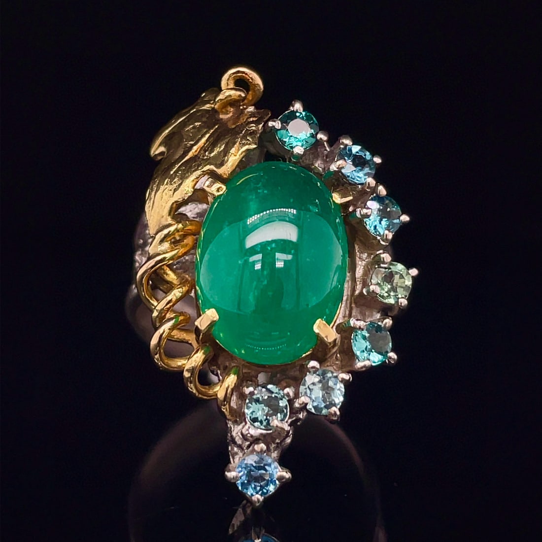 14k Gold 7.45 Ct Vivid Green Natural Emerald Ring: Ref:230992058 // gold content:14k gold // ring size:7. 25us // // main gemstone:emerald // shape:oval // carat weight:7. 45ct // color:vivid green // treatment:natural // Condition: New Low Estimate: