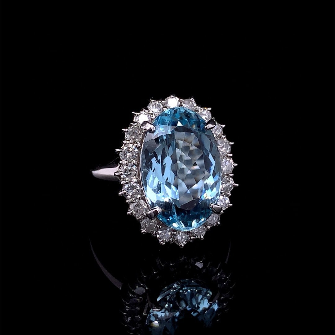 14k Gold 7.09 Ctw Natural Aquamarine & Diamond Ring: Ref:230992064 // gold content:14k gold // ring size:7. 25us // // main gemstone:aquamarine // shape:oval // carat weight:6. 27ct // color:blue // treatment:natural // // adjacent gemstone 2 : diamond