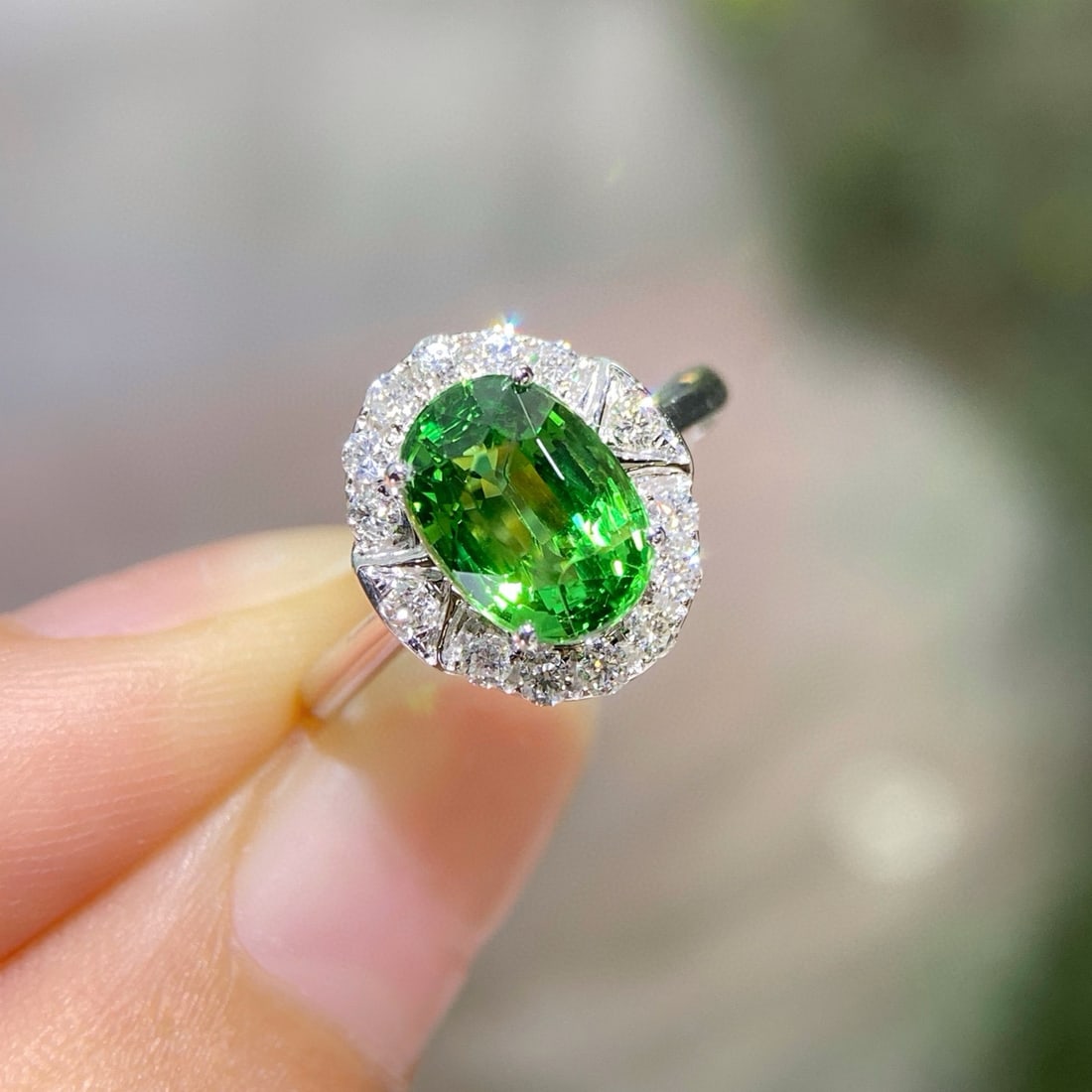 14k Gold 2.25 Ctw Natural Tsavorite & Diamond Ring: Ref:230992121 // gold content:14k gold // ring size:7. 25us // // main gemstone:tsavorite // shape:oval // carat weight:2. 1ct // color:green // treatment:natural // // adjacent gemstone 2 : diamond /