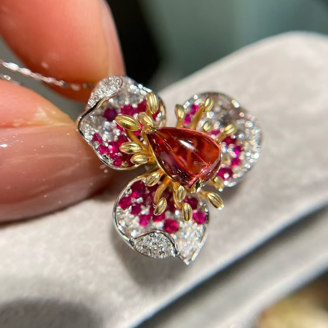 14k Gold 1.3 Ct Natural Tourmaline & Ruby & Diamond Pendant( Without Chain ): Ref:230992168 // gold content:14k gold // main gemstone:tourmaline // shape:pear // carat weight:1. 3ct // color:red // treatment:natural // // adjacent gemstone 2 : ruby // shape:round // color:red /