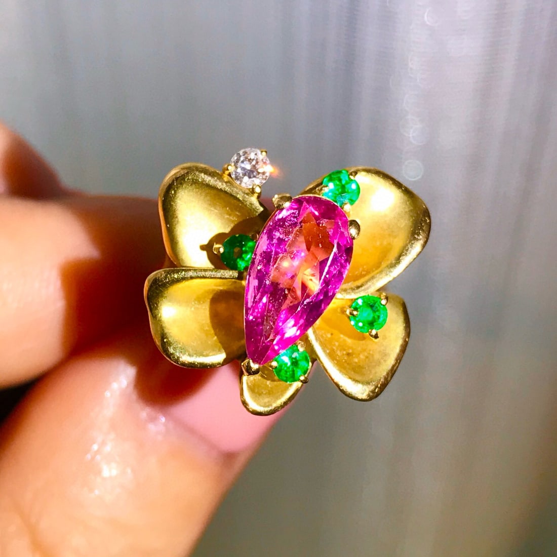14k Gold 1.77 Ctw Natural Tourmaline & Emerald Ring: Ref:230992169 // gold content:14k gold // ring size:7. 25us // // main gemstone:tourmaline // shape:pear // carat weight:1. 52ct // color:red // treatment:natural // // adjacent gemstone 2 : emerald