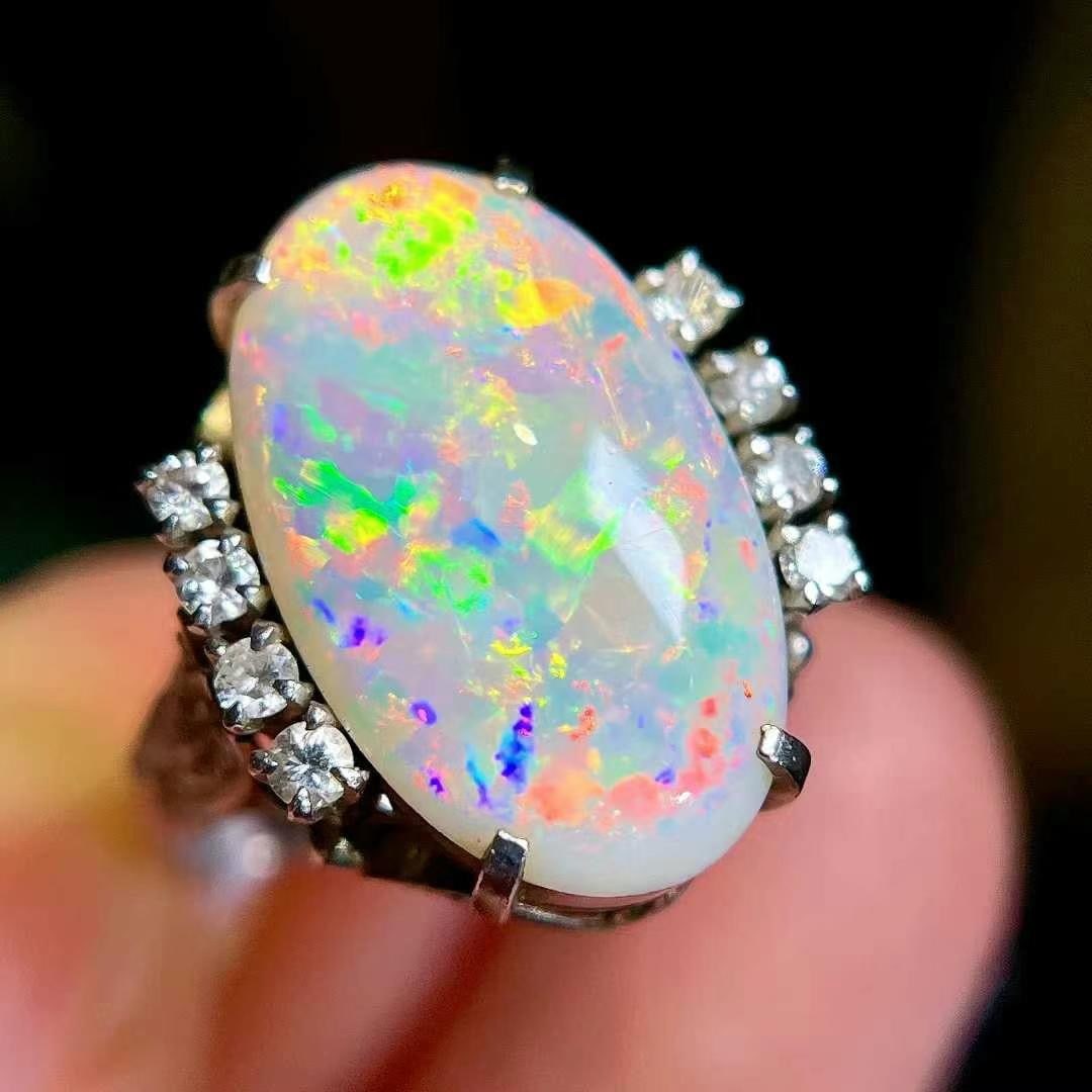 14k Gold 4.36 Ctw Natural Opal & Diamond Ring: Ref:230992181 // gold content:14k gold // ring size:7. 25us // // main gemstone:opal // shape:oval // carat weight:4. 15ct // color:color // treatment:natural // // adjacent gemstone 2 : diamond //