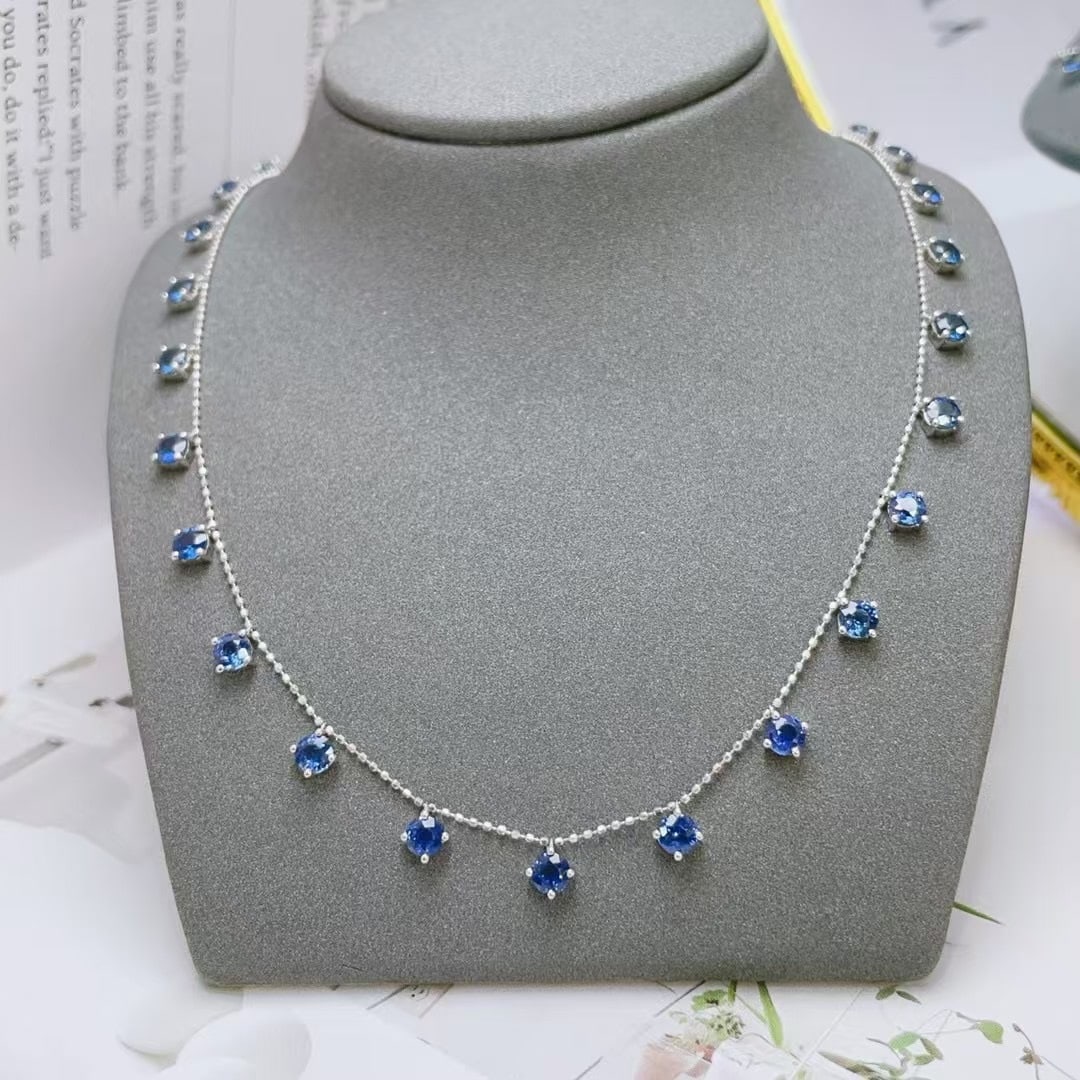 14k Gold 5.33 Ct Natural Sapphire Necklace: Ref:230992186 // gold content:14k gold // main gemstone:sapphire // shape:round // carat weight:5. 33ct // color:blue // treatment:natural // cut grade:g // Condition: New Low Estimate: 5500.00 High E