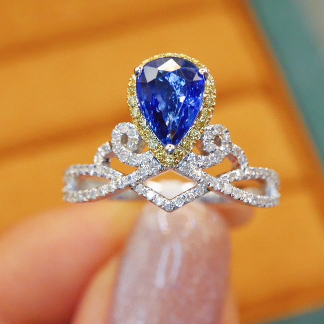 14k Gold 1.43 Ctw Natural Sapphire & Diamond Ring: Ref:230992187 // gold content:14k gold // ring size:7. 25us // // main gemstone:sapphire // shape:pear // carat weight:1. 12ct // color:royal blue // treatment:natural // // adjacent gemstone 2 :