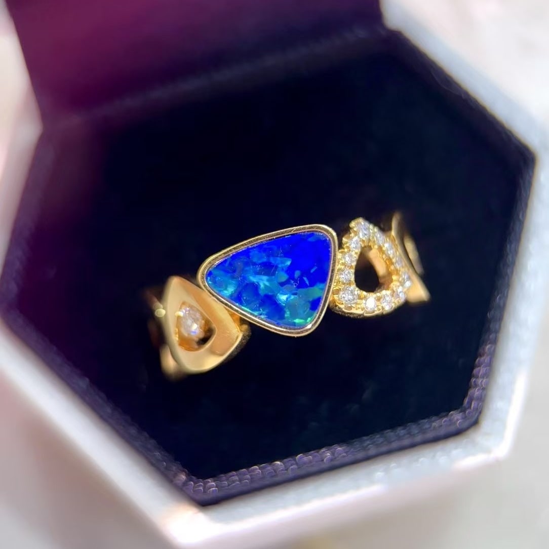 14k Gold 1.20 Ctw Natural Opal & Diamond Ring: Ref:230992198 // gold content:14k gold // ring size:7. 25us // // main gemstone:opal // shape:other // carat weight:1. 08ct // color:color // treatment:natural // // adjacent gemstone 2 : diamond //