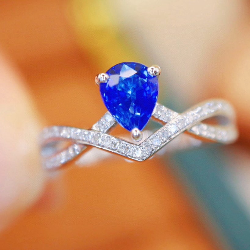 14k Gold 0.98 Ctw Natural Sapphire & Diamond Ring: Ref:230992238 // gold content:14k gold // ring size:7. 25us // // main gemstone:sapphire // shape:pear // carat weight:0. 82ct // color:royal blue // treatment:natural // // adjacent gemstone 2 :