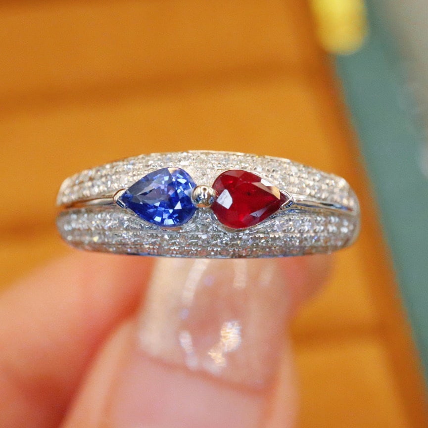 14k Gold 0.58 Ctw Natural Ruby & Sapphire Ring: Ref:230992265 // gold content:14k gold // ring size:7. 25us // // main gemstone:ruby // shape:pear // carat weight:0. 31ct // color:red // treatment:natural // // adjacent gemstone 2 : sapphire //