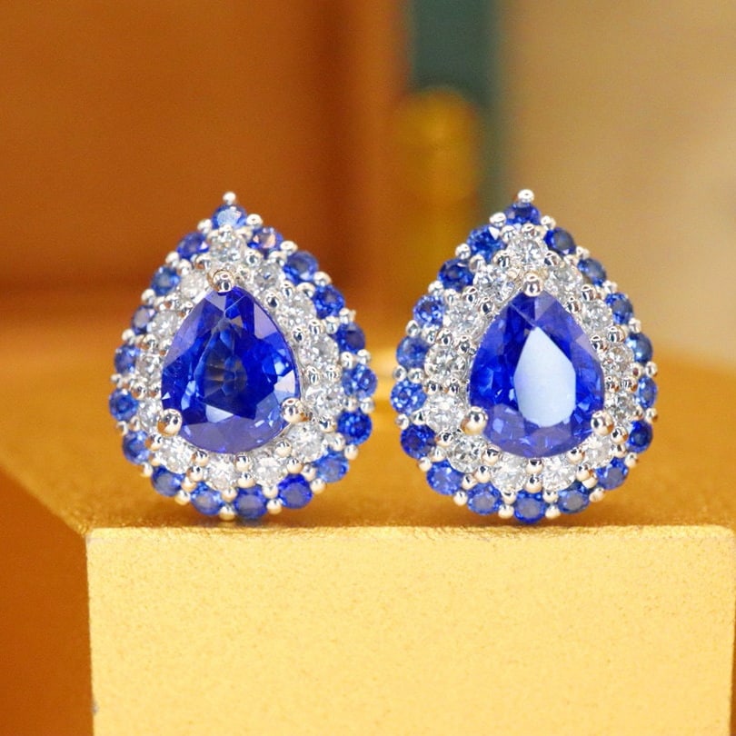 14k Gold 1.39 Ctw Natural Sapphire & Sapphire Earrings: Ref:230992287 // gold content:14k gold // main gemstone:sapphire // shape:pear // carat weight:1. 0ct // color:royal blue // treatment:natural // // adjacent gemstone 2 : sapphire // shape:round //